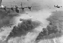 https://upload.wikimedia.org/wikipedia/commons/thumb/0/04/B-24D%27s_fly_over_Polesti_during_World_War_II.jpg/220px-B-24D%27s_fly_over_Polesti_during_World_War_II.jpg